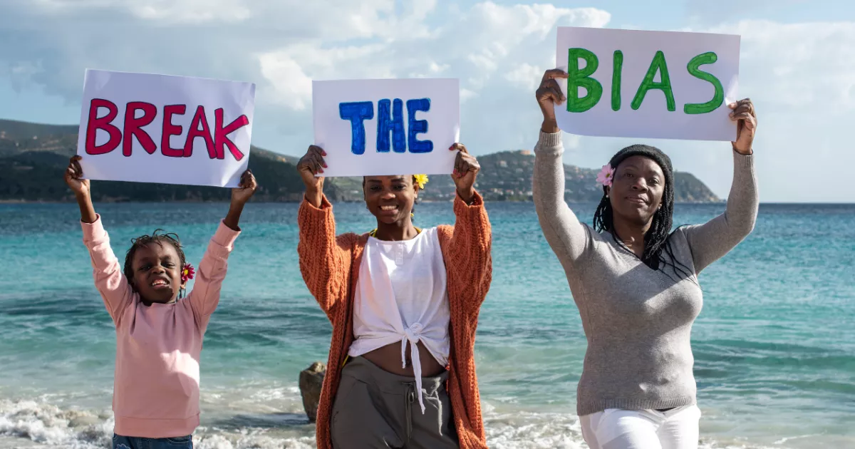 Sign that says ‘’ break the bias’’ | Eric Bailey